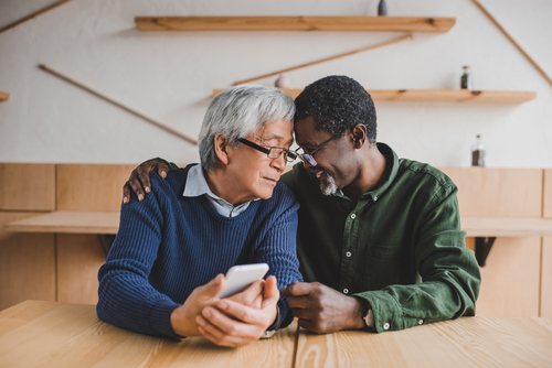 same sex couple embracing one another