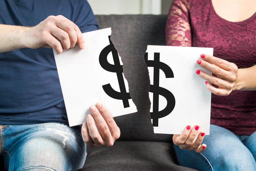 man and a woman having a financial argument over an inheritance
