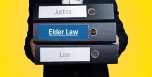 3 file folders with text label Justice, elder law and Law
